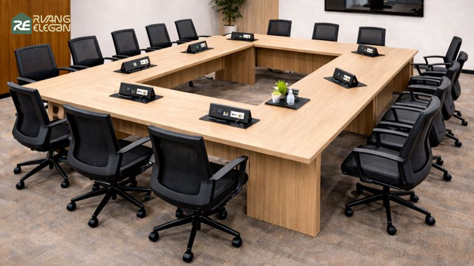 Contoh meeting table dengan socket di tengahnya.